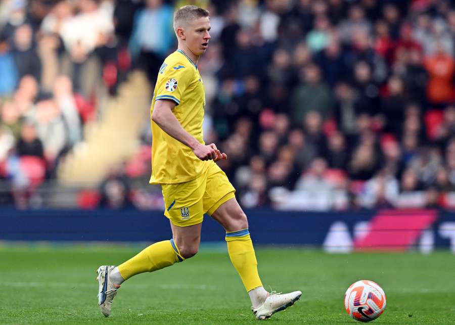 Ukraine's midfielder Oleksandr Zinchenko controls the ball