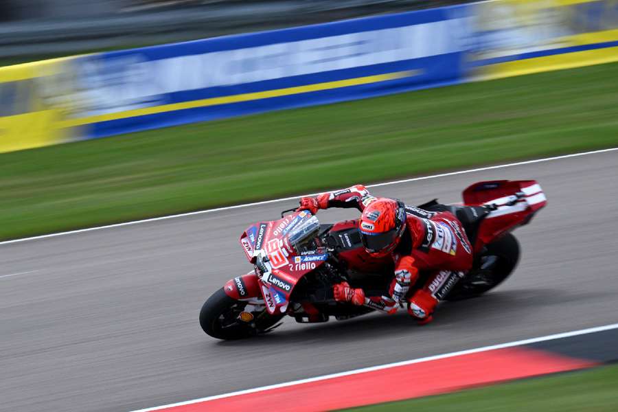 Marc Marquez in sprint action Marc Marquez in sprint action