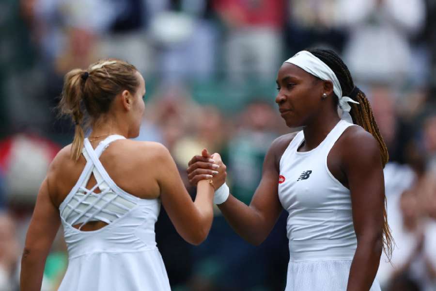 Sofia Kenin shakes hands with Coco Gauff after winning the first-round match