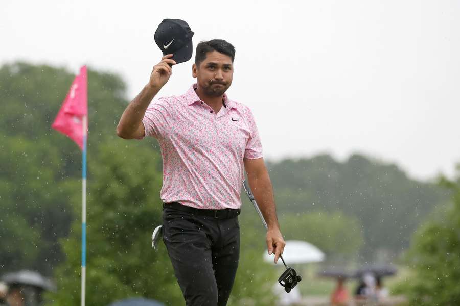 Australian Jason Day celebrates with his son Dash Day after winning the PGA Tour's Byron Nelson tournament on Sunday