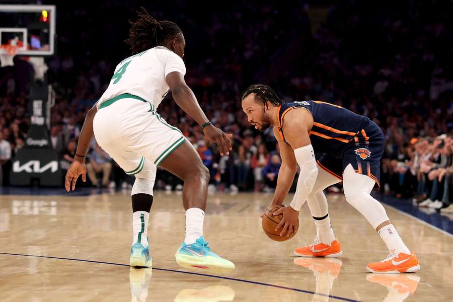 Knicks guard Jalen Brunson (right) defended by Celtics guard by Jrue Holiday (left) during Game 4 (2025 NBA Playoffs)