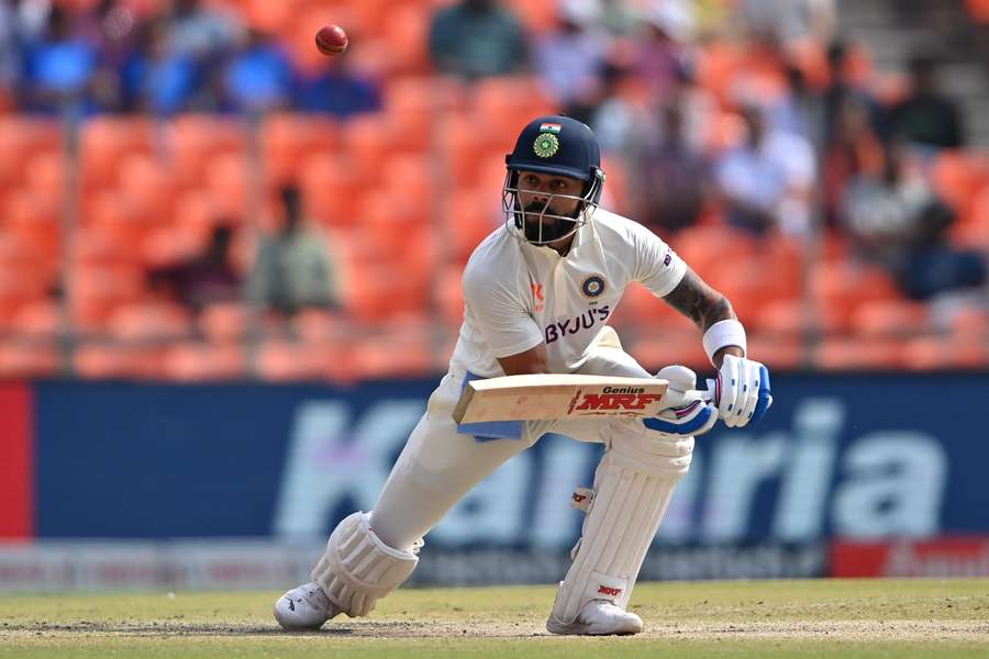 India's Virat Kohli watches the ball after playing a shot