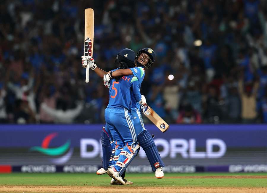 India's Amanjot Kaur and Jemimah Rodrigues celebrate winning the semi-final India's Amanjot Kaur and Jemimah Rodrigues celebrate winning the semi-final