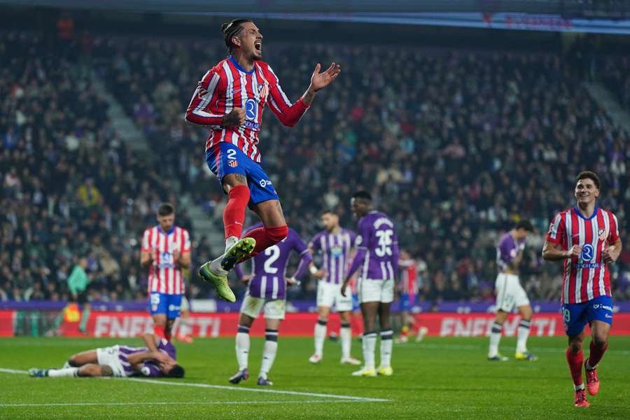 Jose Gimenez celebrates scoring