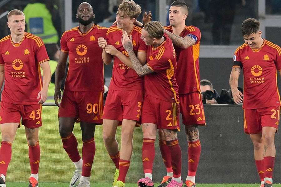 Roma celebrate a goal against Lazio