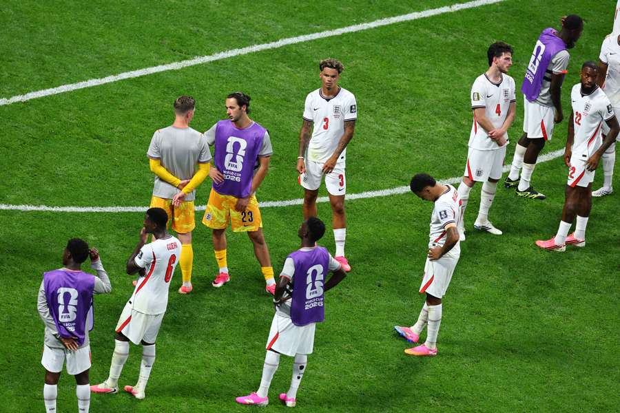 England players after their 2026 FIFA World Cup defeat to Argentina.