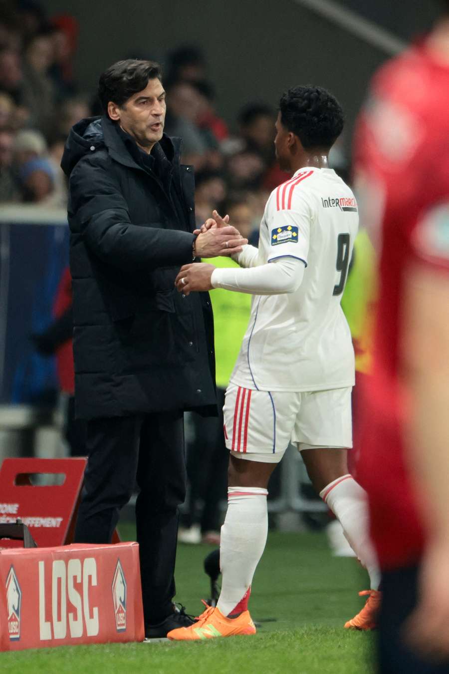 Paulo Fonseca greets Endrick as he leaves the pitch Paulo Fonseca greets Endrick as he leaves the pitch