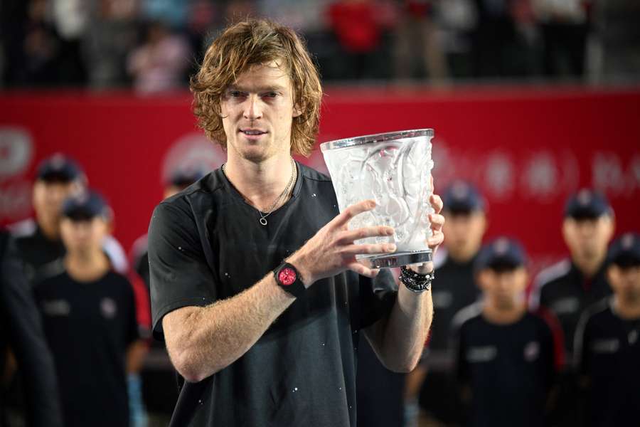 Andrey Rublev celebrates winning the Hong Kong Open against Finland's Emil Ruusuvuori