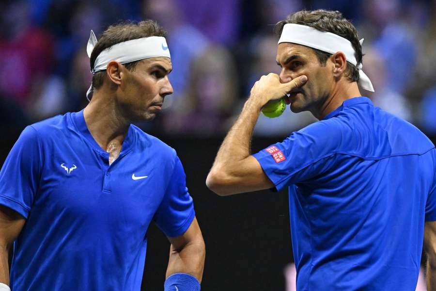 Roger Federer communicates with Rafael Nadal in their Laver Cup doubles match at the O2 Arena.