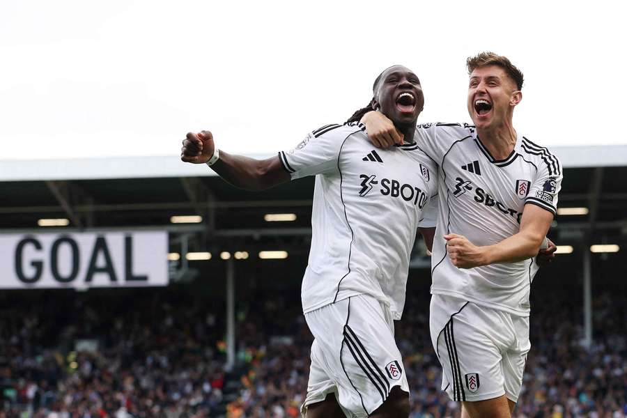 Fulham celebrate after Gabriel Gudmundsson scores a late own goal for Leeds