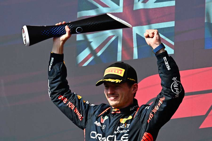 Red Bull Racing's Dutch driver Max Verstappen celebrates on the podium