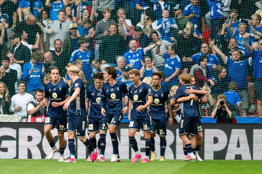 Lyngby celebrate their unlikely win in Viborg
