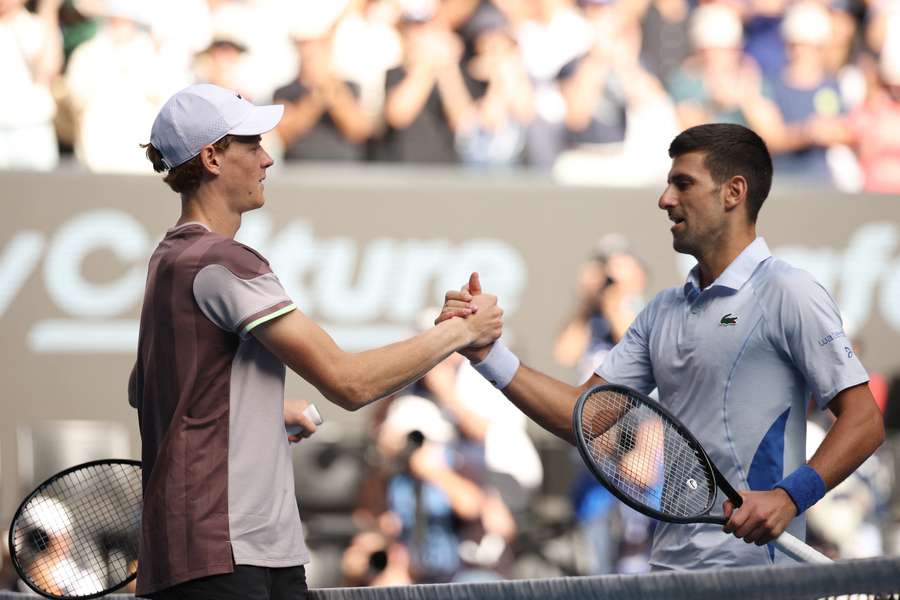 Novak Djokovic (R) with Jannik Sinner at this year's Australian Open