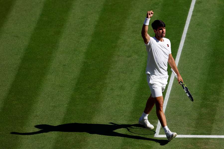 Carlos Alcaraz celebrates during his semi-final match against Taylor Fritz
