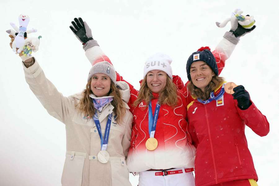 Marianne Fatton of Switzerland, Emily Harrop of France and Ana Alonso Rodriguez of Spain celebrate on the podium