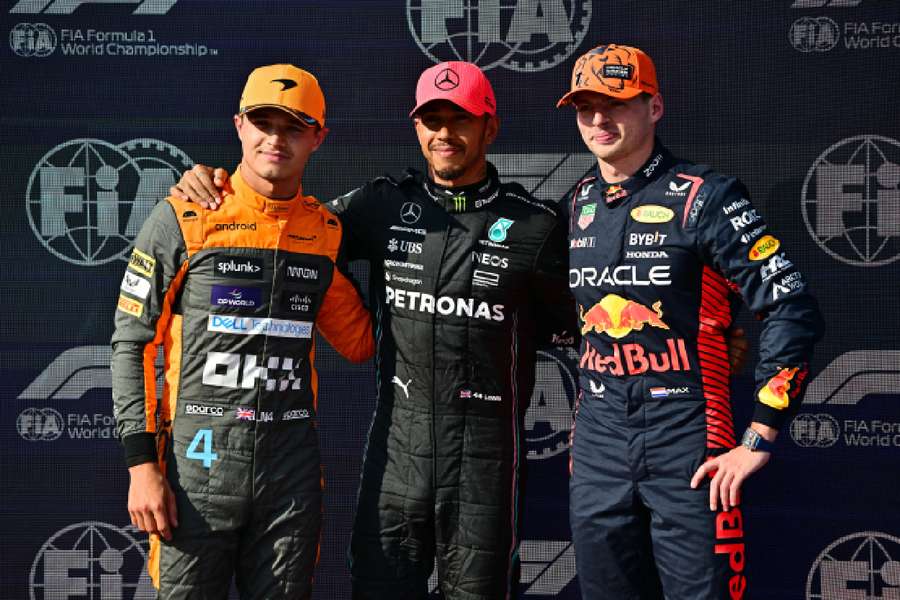 Mercedes' Lewis Hamilton, Red Bull's Max Verstappen and McLaren's Lando Norris pose after finishing first, second and third position in qualifying