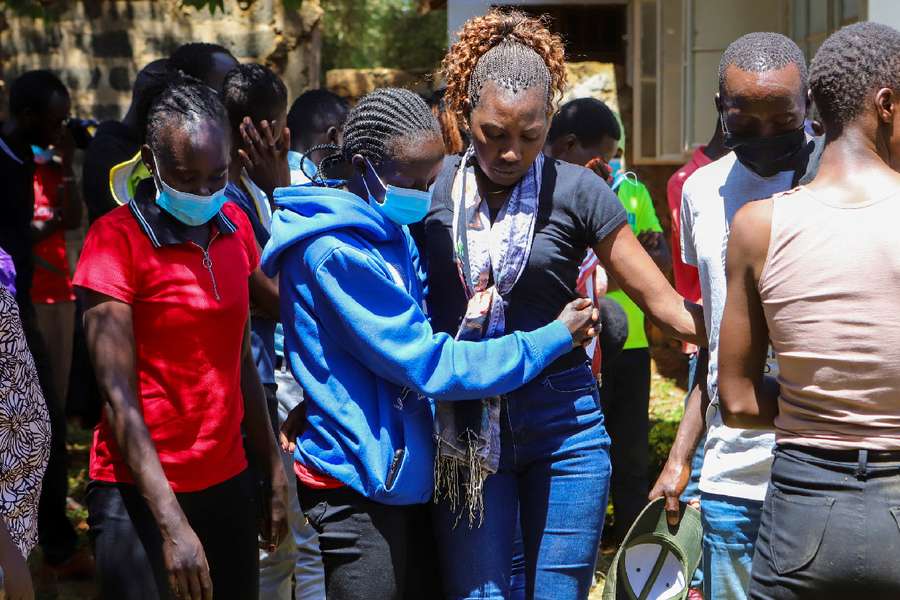 People react after viewing body of Kenya's marathon world record holder Kelvin Kiptum