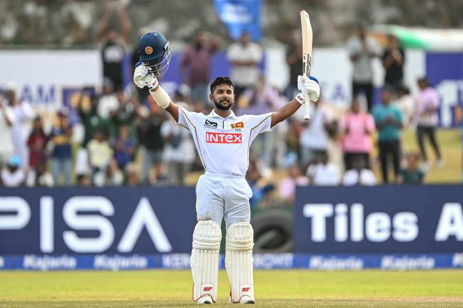Sonal Dinusha celebrates his century for Sri Lanka Sonal Dinusha celebrates his century for Sri Lanka