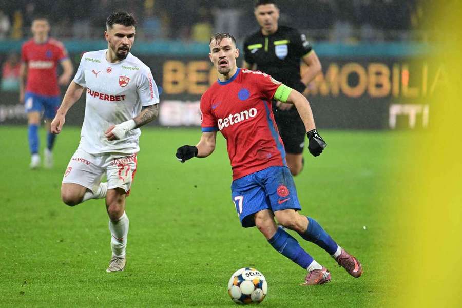 Darius Olaru, în duel cu Danny Armstrong Darius Olaru, în duel cu Danny Armstrong