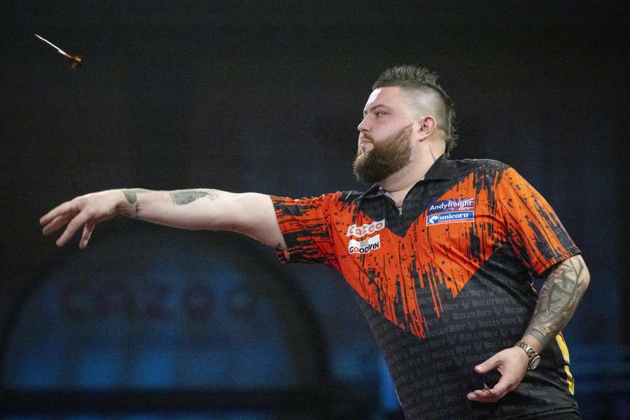 Michael Smith gooide twee keer 180 en vervolgens triple-20, triple-19 en dubbel-12