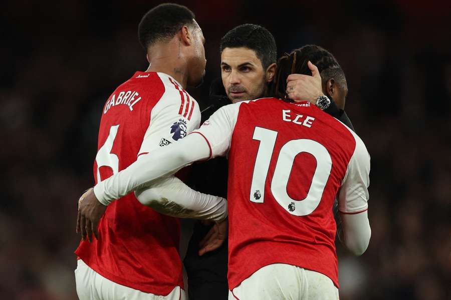 Mikel Arteta celebrates with Gabriel Magalhães and Eberechi Eze after Arsenal’s Premier League victory.