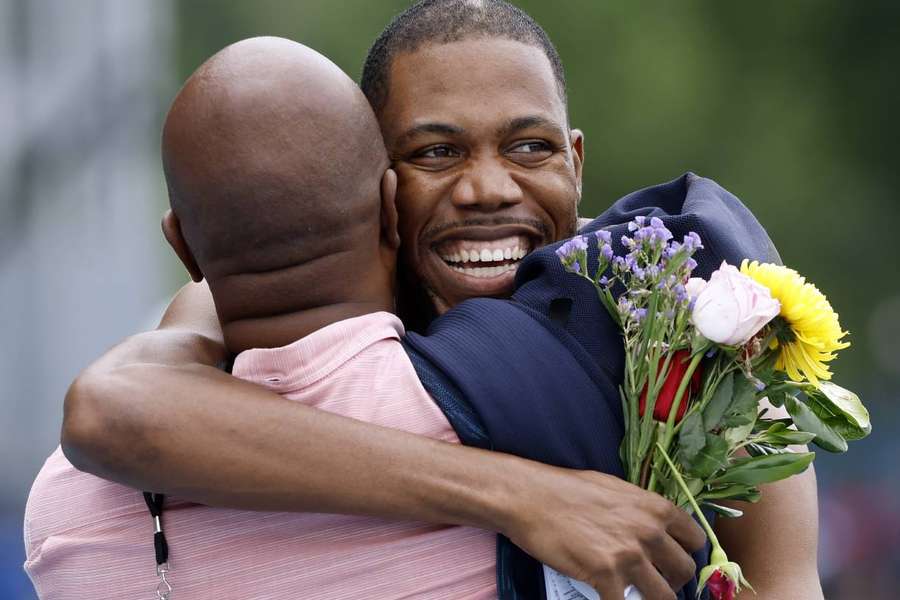 Zharnel Hughes reacts after breaking Linford Christie's 100m record at the NYC Grand Prix