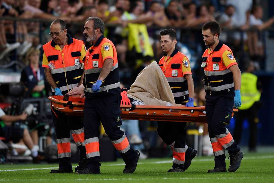 Barcelona's Marc-Andre ter Stegen is stretchered off after sustaining his injury on Sunday