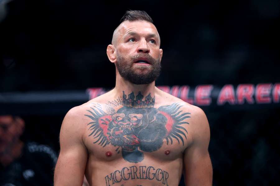 Conor McGregor looks on in a welterweight bout against Max Holloway Conor McGregor looks on in a welterweight bout against Max Holloway