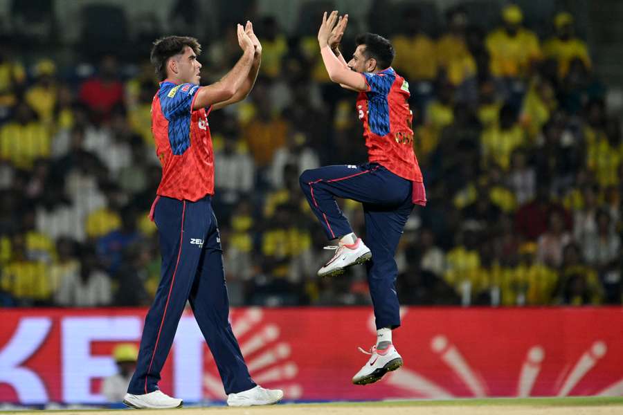 Xavier Bartlett (L) and Yuzvendra Chahal (R) celebrate after the dismissal of Sanju Samson Xavier Bartlett (L) and Yuzvendra Chahal (R) celebrate after the dismissal of Sanju Samson