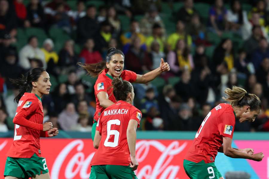 Morocco players celebrate scoring