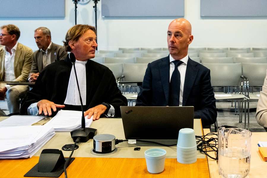 KNVB lawyer Michiel van Dijk and KNVB commercial director Mark Boetekees before Thursday's summary proceedings KNVB lawyer Michiel van Dijk and KNVB commercial director Mark Boetekees before Thursday's summary proceedings