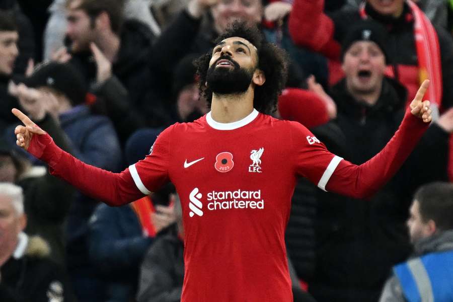 Salah celebrates scoring at Anfield