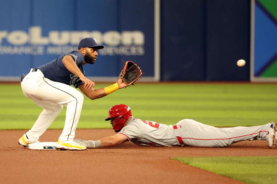 Los Angeles Angels outfielder Mike Trout steals second base as Tampa Bay Rays outfielder Amed Rosario attempts to tag him out