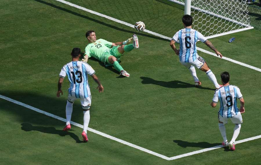 Argentina's Emiliano Martinez makes a save Argentina's Emiliano Martinez makes a save