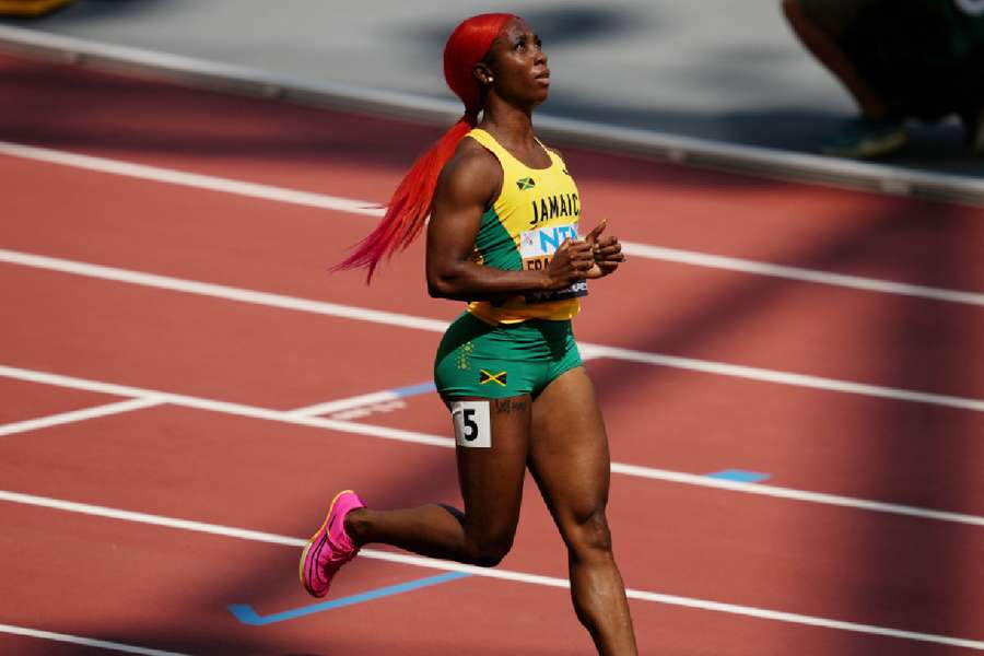 Jamaica's Fraser-Pryce celebrates after winning her heat