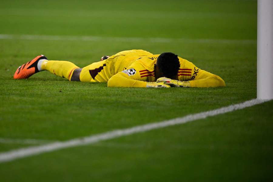 Andre Onana reacts after conceding the opening goal against Bayern