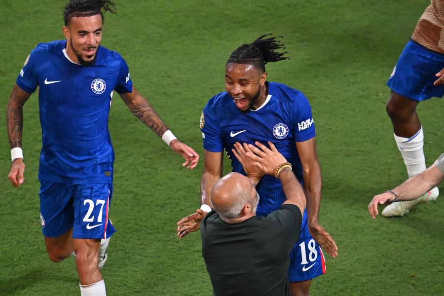 Chelsea celebrate Christopher Nkunku's winner to get past Benfica at the Club World Cup.