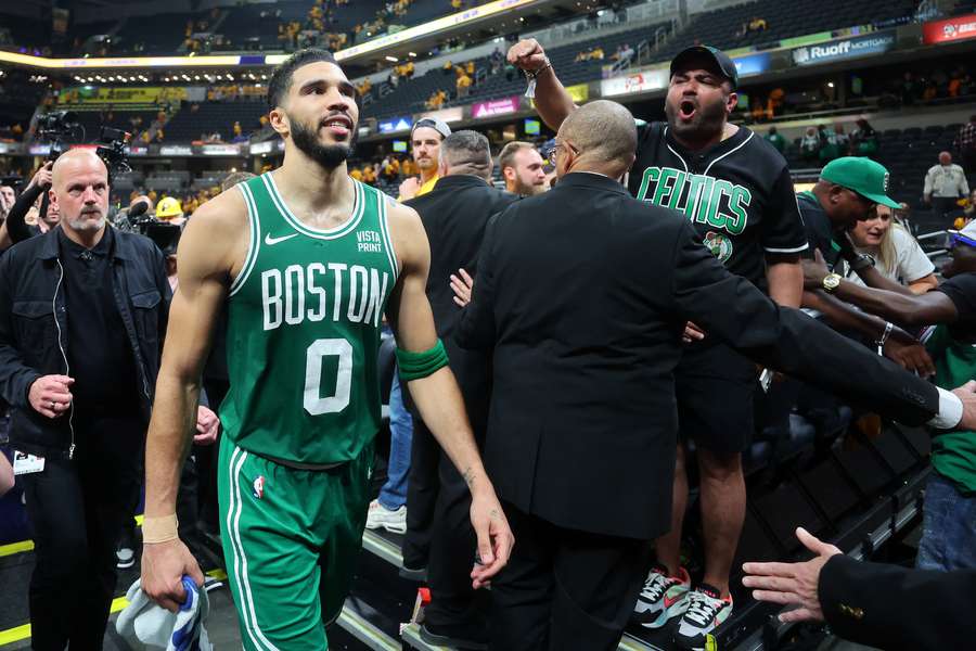 Boston's Jayson Tatum walks off the court after the Celtics' victory over the Indiana Pacers in Game 3 of the NBA Eastern Conference finals