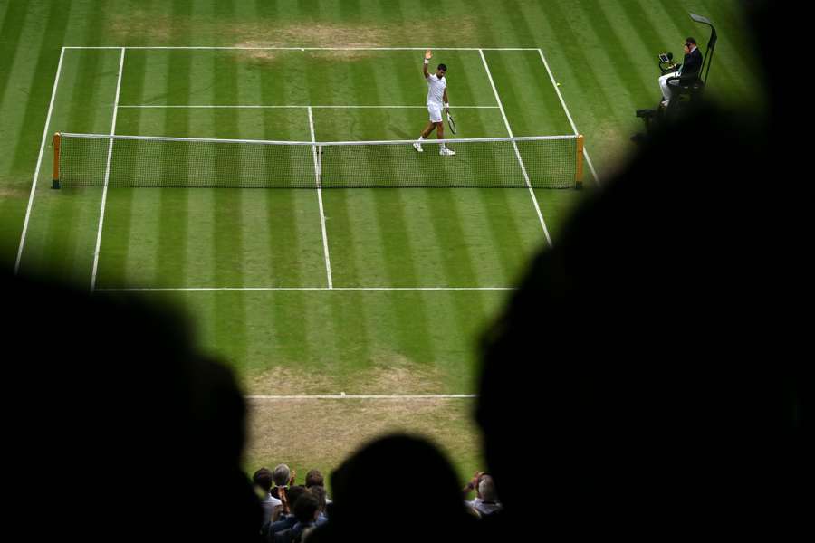 Novak Djokovic celebrates beating Hubert Hurkacz