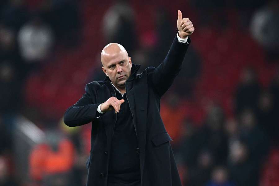 Arne Slot celebrates after Liverpool's midweek win over Tottenham