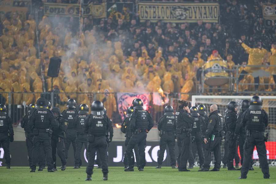 Riot police marshal the game on Saturday Riot police marshal the game on Saturday