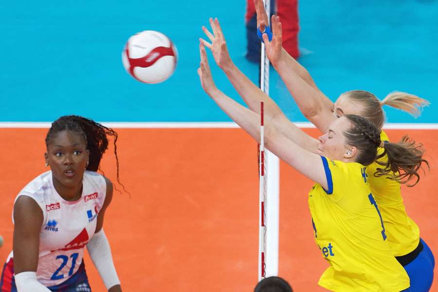 Elma Olofsson and Hanna Hellvig of Sweden attempt to make a block against France Elma Olofsson and Hanna Hellvig of Sweden attempt to make a block against France