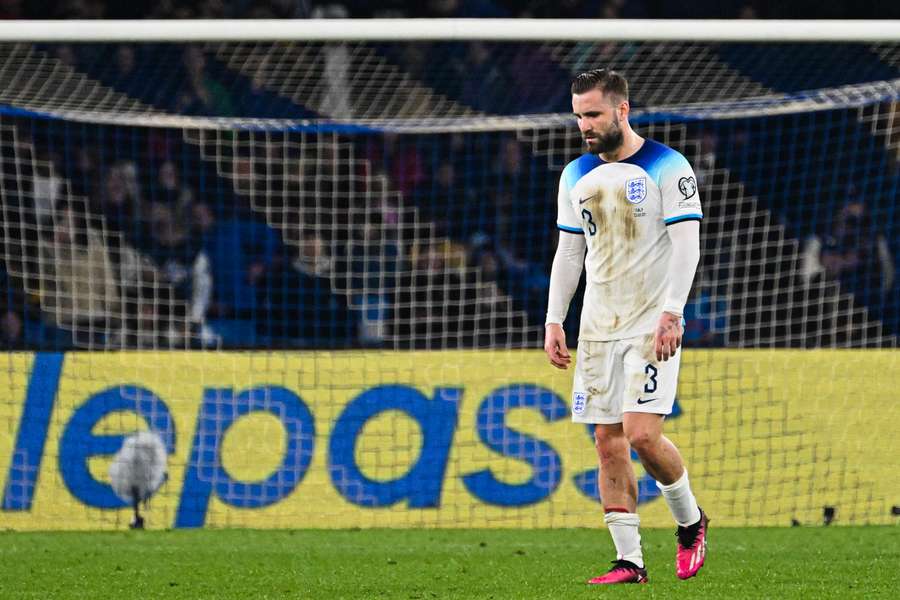 Luke Shaw walks off after being sent off