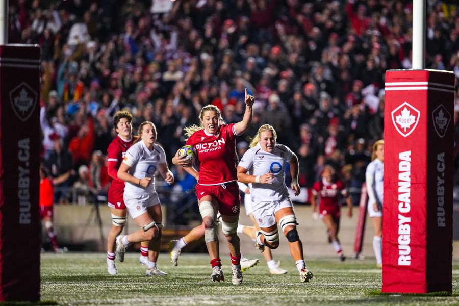 Canada's Sophie de Goede runs with the ball during the WXV Global Series match against England