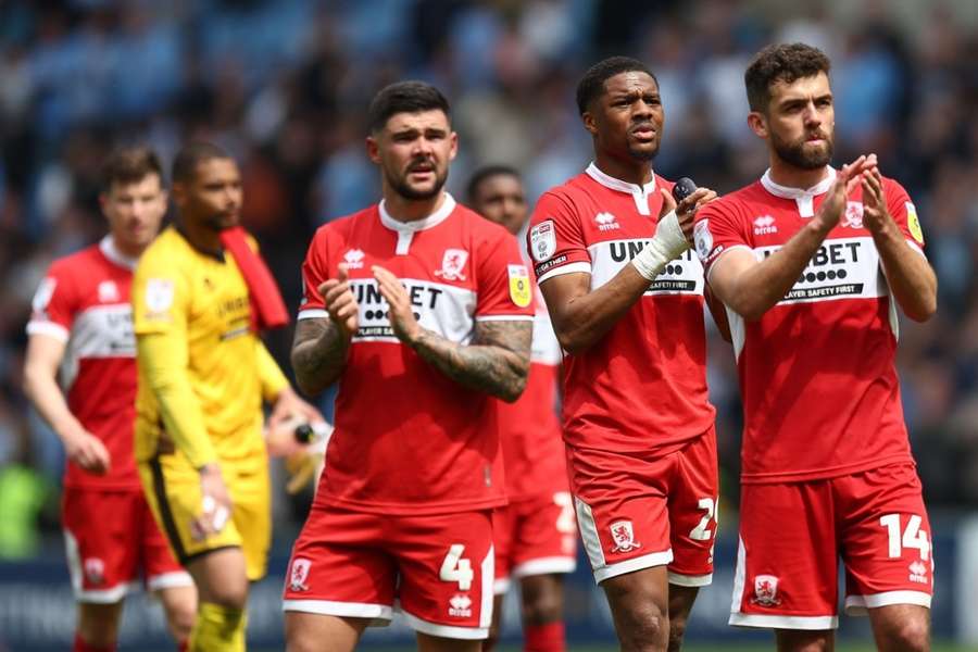 Middlesbrough's players applaud the travelling fans after the first leg