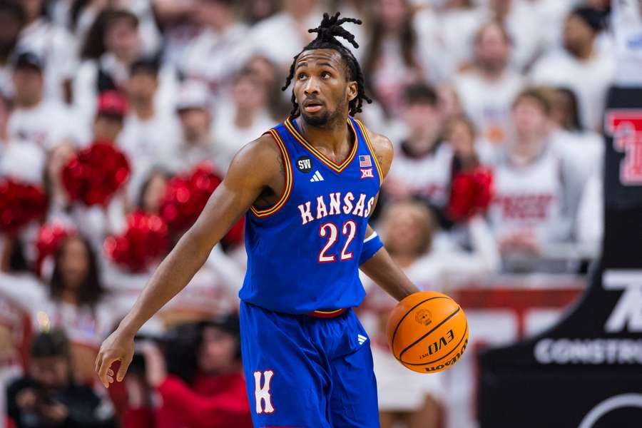 Kansas' Darryn Peterson dribbles the ball Kansas' Darryn Peterson dribbles the ball