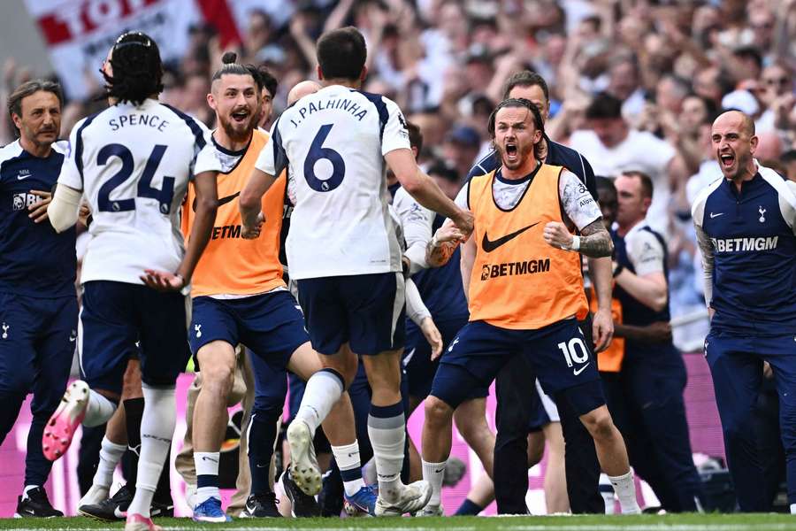 Tottenham Hotspur's Joao Palhinha celebrates scoring their first goal with teammates Tottenham Hotspur's Joao Palhinha celebrates scoring their first goal with teammates