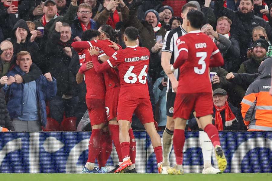 Liverpool players celebrating a goal