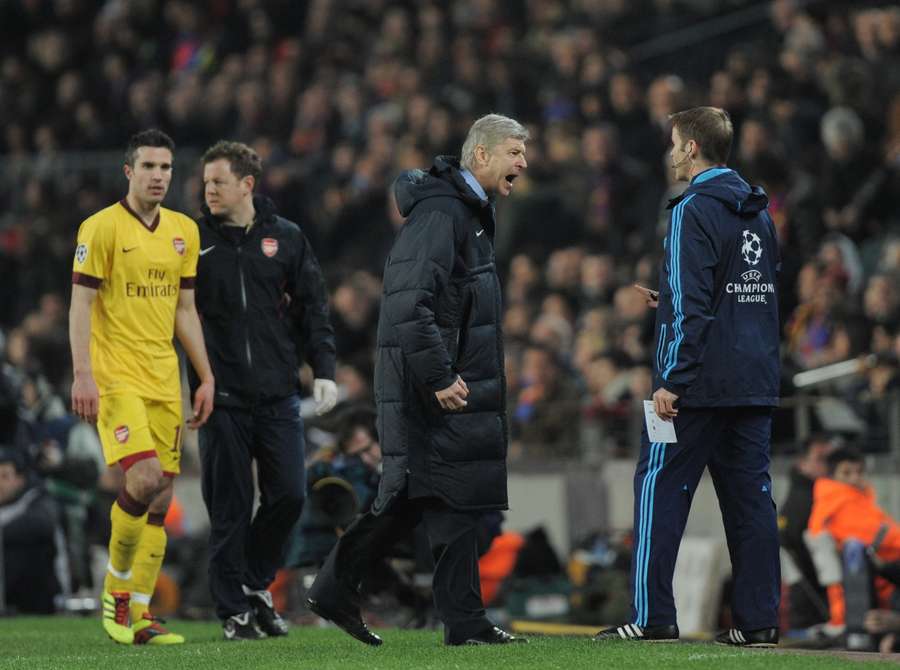 Arsene Wenger reacts as Robin van Persie is sent off Arsene Wenger reacts as Robin van Persie is sent off
