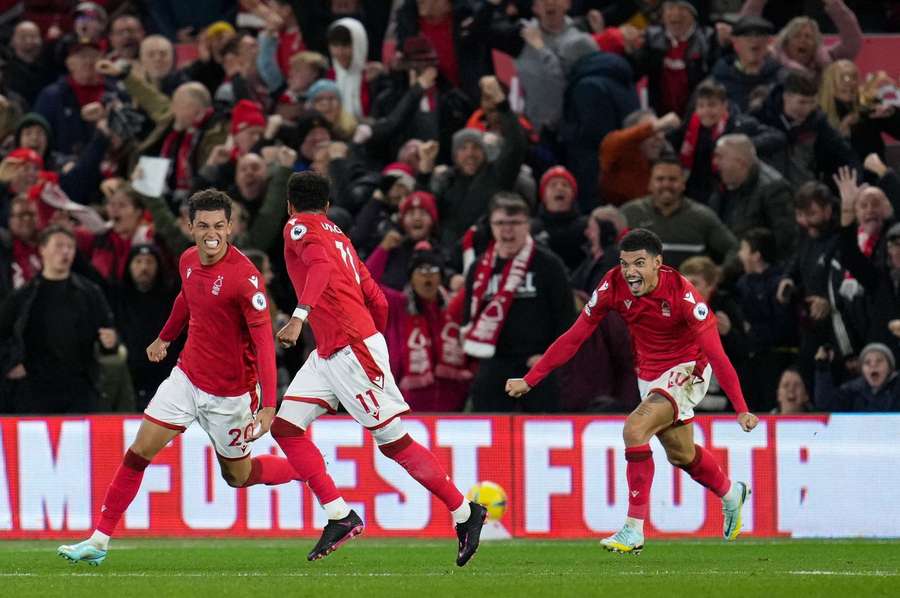 The Forest players celebrate their late equaliser